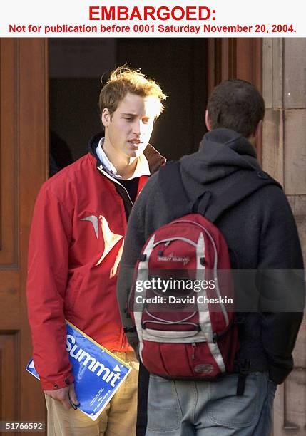 Prince William pauses to talk to a friend on November 15, 2004 at St Andrews University, Scotland. The Prince is in the last year of his four-year...