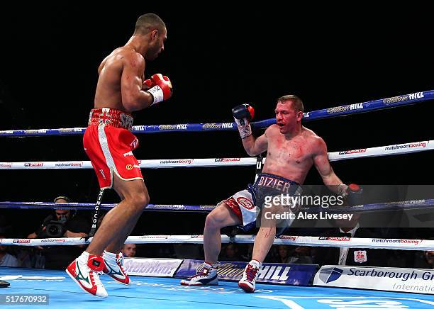 Kell Brook knocks down and stops Kevin Bizier in the second round during his victory in the IBF World Welterweight Championship between Kell Brook...
