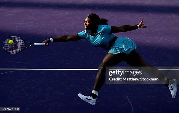 Serena Williams lunges for a shot while playing Zarina Diyas of Kazakhstan during the Miami Open presented by Itau at Crandon Park Tennis Center on...