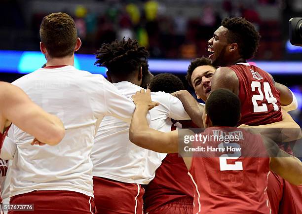 Buddy Hield of the Oklahoma Sooners celebrates their 80-68 victory against the Oregon Ducks in the NCAA Men's Basketball Tournament West Regional...