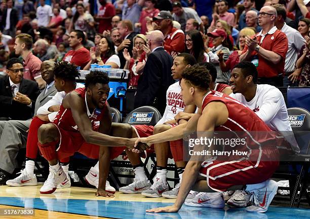 Khadeem Lattin and Jamuni McNeace of the Oklahoma Sooners celebrate late in the second half while taking on the Oregon Ducks in the NCAA Men's...
