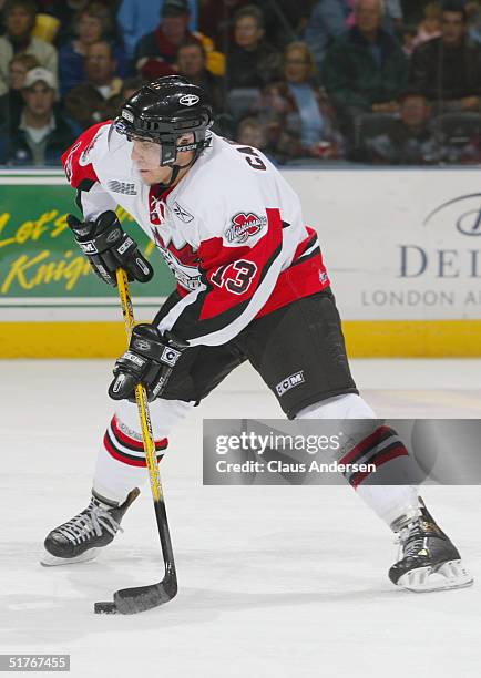 Daniel Carcillo of the Mississauga IceDogs looks to put a shot on net against the London Knights during the Ontario Hockey League game at John Labatt...