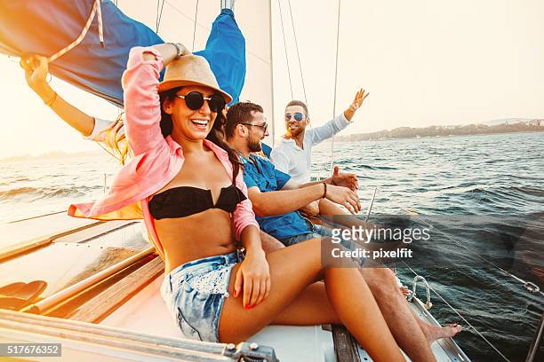 enjoying the sea travel - boat party stock pictures, royalty-free photos & images