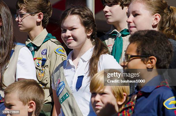 girl scouts and boy scouts - girl guides badges stockfoto's en -beelden