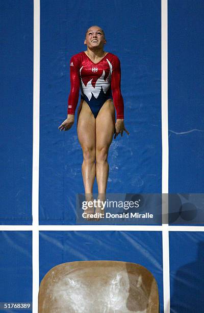 Courtney McCool competes in the Vault during the Women's All-Around Prelims, 2004 Gymnastics Olympic Team Trials at the Arrowhead Pond of Anaheim on...