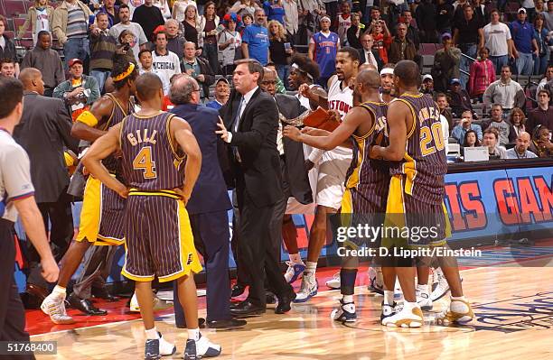 The Indiana Pacers and the Detroit Pistons mix it up in a scuffle on November 19, 2004 during their game at the Palace of Auburn Hills, in Auburn...