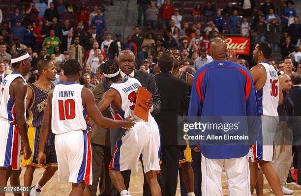 The Indiana Pacers and the Detroit Pistons mix it up in a scuffle on November 19, 2004 during their game at the Palace of Auburn Hills, in Auburn...