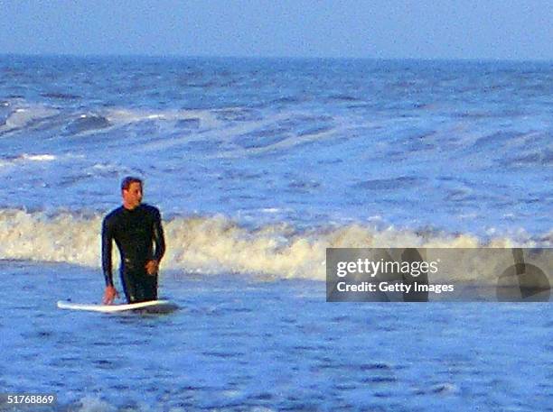 Prince William surfing at St Andrews in Scotland, where he is in the last year of his four-year university course.