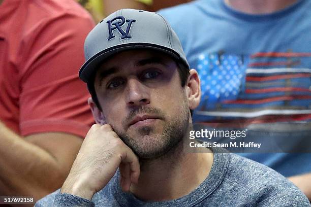 Quarterback Aaron Rodgers of the Green Bay Packers watches the NCAA Men's Basketball Tournament West Regional Final at Honda Center on March 26, 2016...