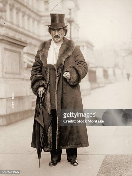 Portrait of Polish pianist and Prime Minister of Poland Ignacy Jan Paderewski as he poses on a sidewalk, early to mid 20th century.