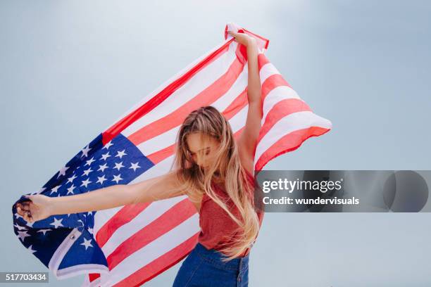 beautiful young hipster woman with usa flag - girl with beautiful hair stock pictures, royalty-free photos & images