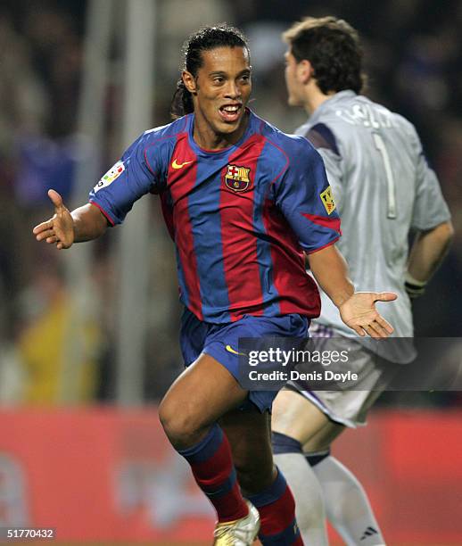 Barcelona's Ronaldinho reacts after scoring a goal against Real Madrid during their la Liga match at Nou Camp on November 20, 2004 in Barcelona,...