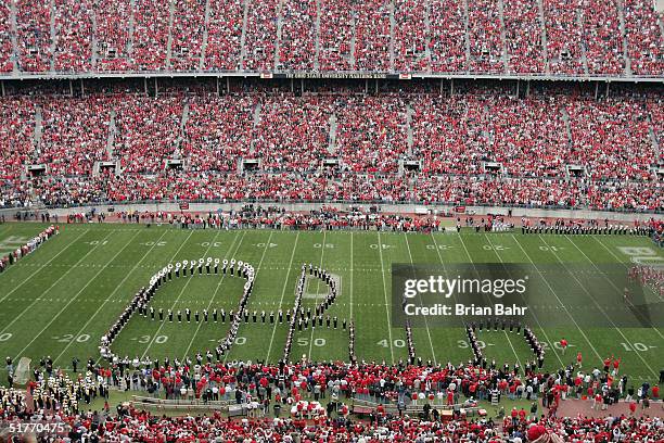 The Ohio State Buckeyes marching band spells out Ohio to the cheers of fans before their game against the Michigan Wolverines on November 20, 2004 at...