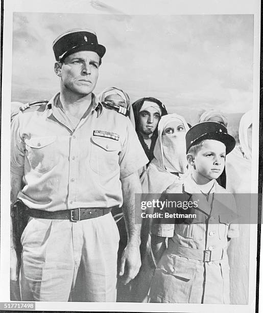 Actor Buster Crabbe and his 11 year old son, Cullen, star side-by-side in a new TV series about the French Foreign Legion. The unusual father-son...