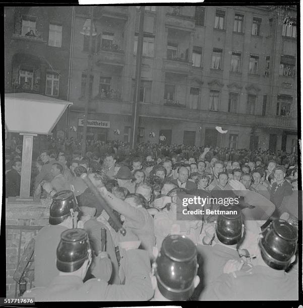 Violent Saturday in West Berlin...Thousands of East Berlin Communists staged the biggest post-war riot in the British sector of the city when they...