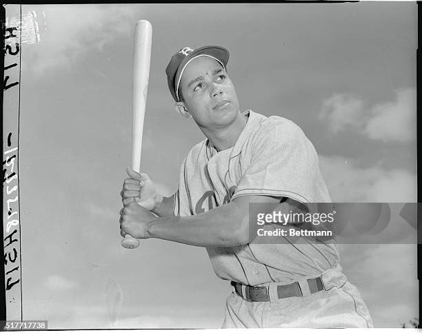 Chico Fernandez, infielder for the Brooklyn Dodgers is shown here posing with a Bat.