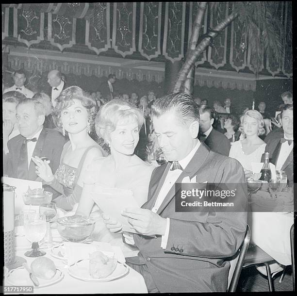 Debbie Reynolds and Glenn Ford appeared to be a happy couple among the many Hollywood stars attending the Golden Globe Awards sponsored by the...