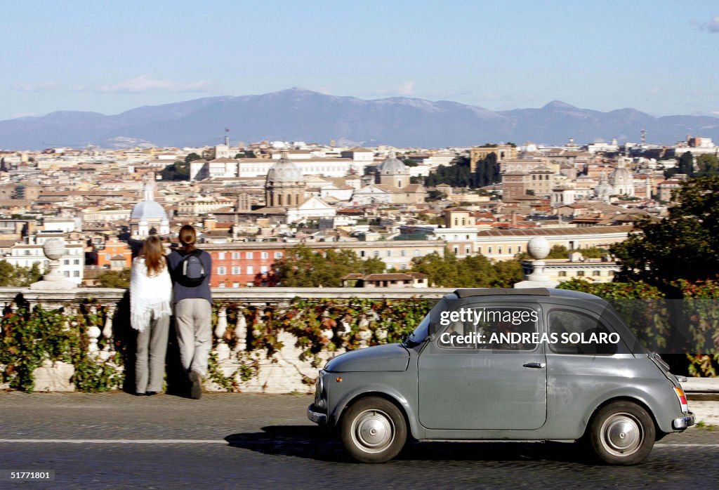 A Fiat 500 is driven on the Gianicolo hi