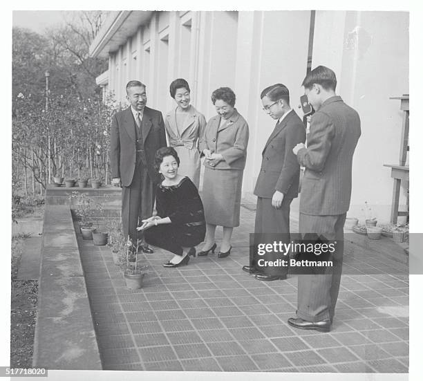 Royal Relaxation. Tokyo, Japan: In a royal get together in Tokyo's imperial palace, Japan's Crown Prince Akihito trains a movie camera on his family....