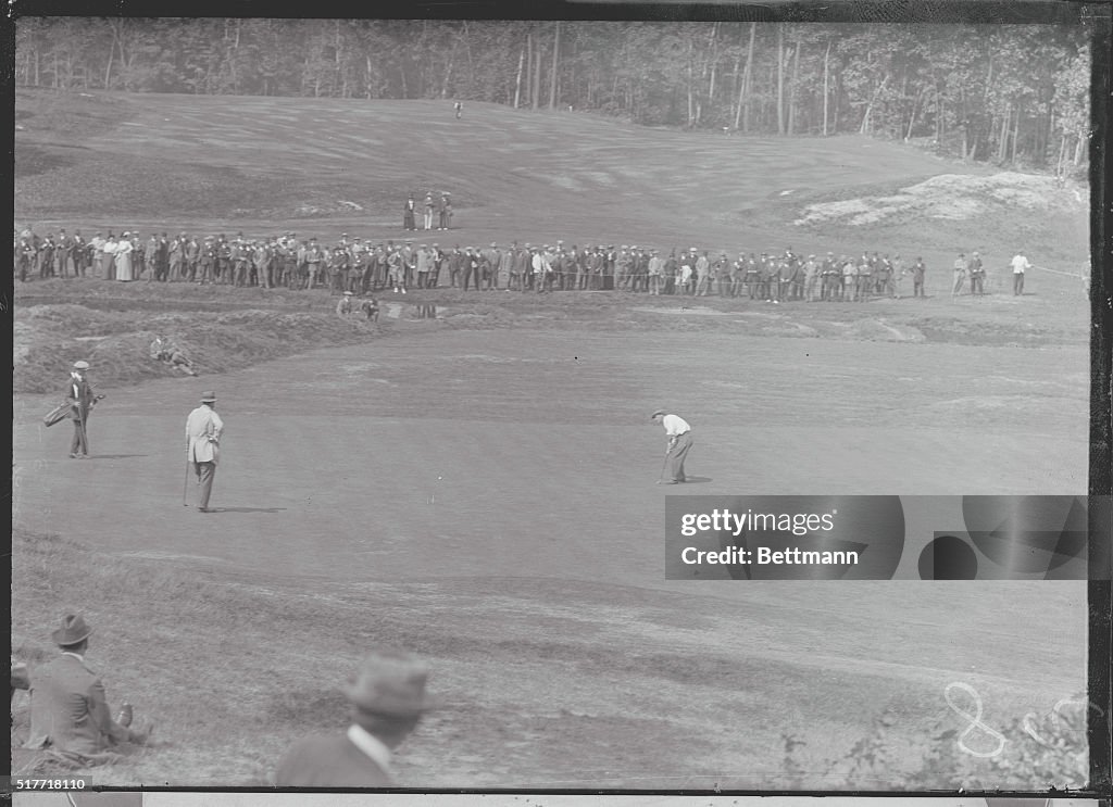 Spectators Watching Golf Game