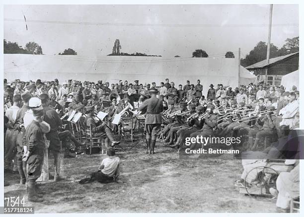 Lieut. And band leader James Reese Europe's and the famed Harlem Hellfighter’s , entertaining the convalescent American soldiers at the old race...