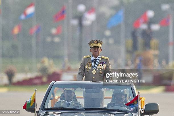 Chief Senior General Min Aung Hlaing, commander in chief of the Myanmar armed forces, inspects troops during a ceremony to mark the 71st Armed Forces...