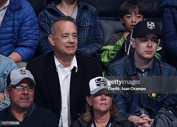 Actors Tom Hanks and Colin Hanks watch the game between the Edmonton Oilers and the Los Angeles Kings on March 26, 2016 at STAPLES Center in Los...