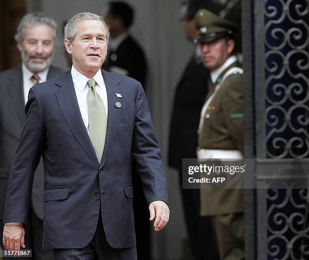 President George W. Bush arrives at the La Moneda Palace in Santiago, Chile, 21 November 2004. Bush, and the leaders of the 21 member countries are...