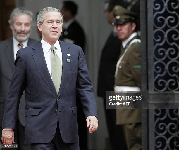 President George W. Bush arrives at the La Moneda Palace in Santiago, Chile, 21 November 2004. Bush, and the leaders of the 21 member countries are...