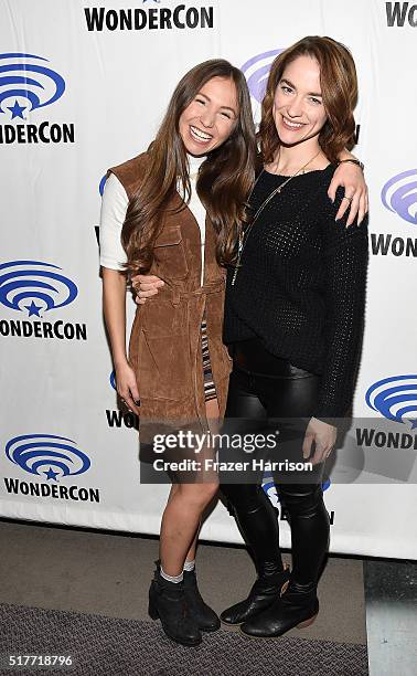 Actors Dominique Provost-Chalkley and Melanie Scrofano attend the Wynonna Earp panel at WonderCon 2016, Day 2 at Los Angeles Convention Center on...