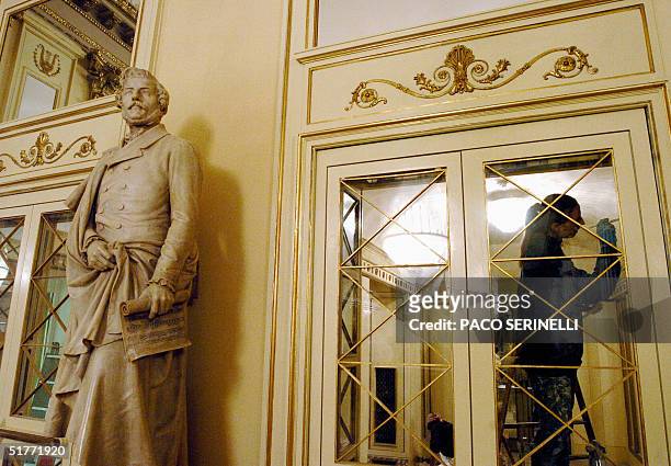 Worker gives the last cleaning,19 November 2004, next to a Gaetano Donizetti's statue in the Milan's La Scala opera house. The famous opera house is...