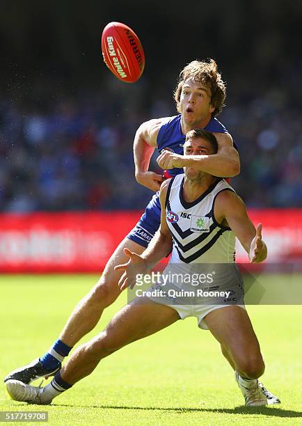 Stephen Hill of the Dockers and Liam Picken of the Bulldogs compete for the ball during the round one AFL match between the Western Bulldogs and the...