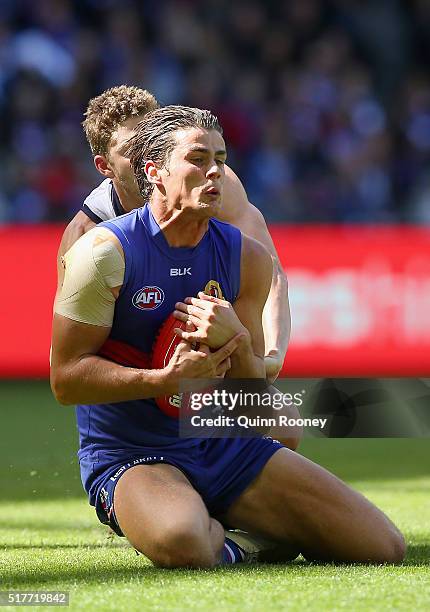 Tom Boyd of the Bulldogs marks during the round one AFL match between the Western Bulldogs and the Fremantle Dockers at Etihad Stadium on March 27,...