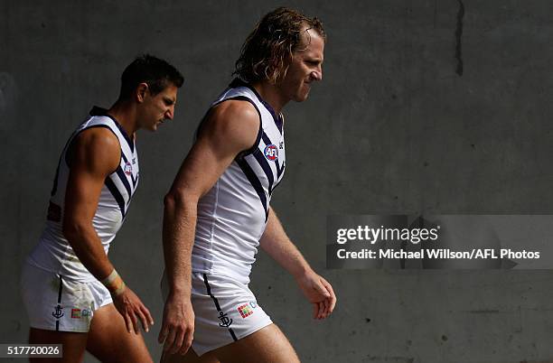 Matthew Pavlich and David Mundy of the Dockers walk onto the field during the 2016 AFL Round 01 match between the Western Bulldogs and the Fremantle...