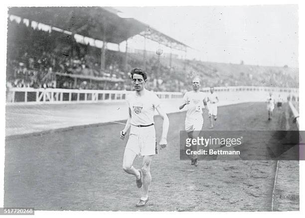 Olympic Games, London, England 1908- 1500 meter flat race, 1st heat, J. Sullivan, U.S.A 1st and J.D. Lightbody, U.S.A 2nd.