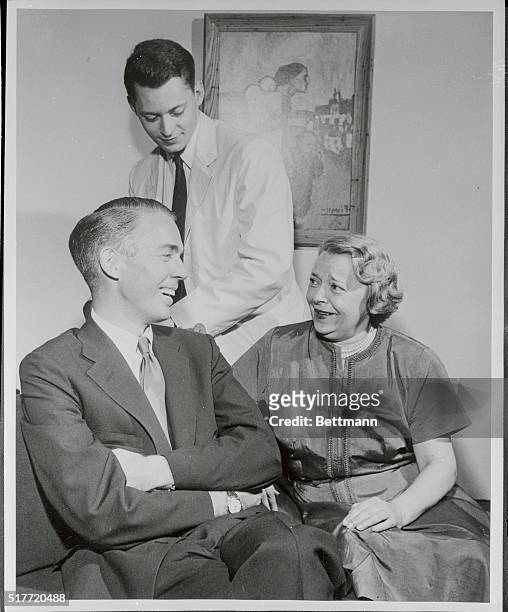 Actor John Kerr, left, is shown chatting in New York during a rehearsal of All Summer Long, a play by Robert Anderson, right. With them is June...
