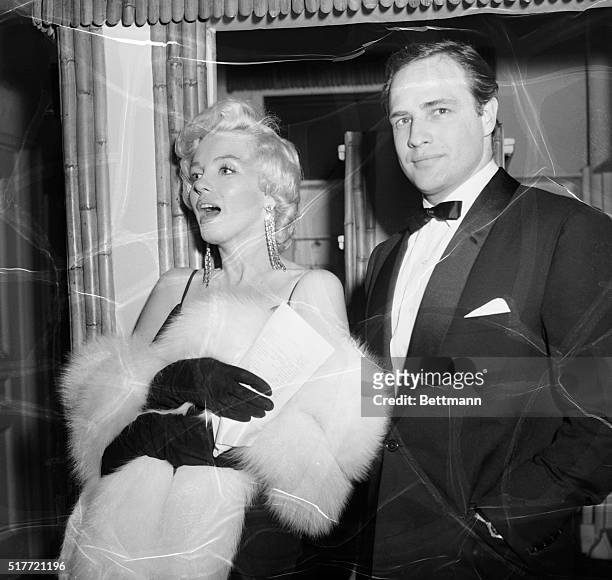 New York,NY: Top film idols Marilyn Monroe and Marlon Brando put in an appearence at the Sheraton Aster Hotel Late December 12th, for the second...