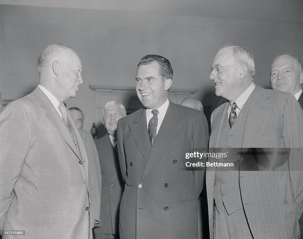 Dwight Eisenhower with Richard Nixon and John Foster Dulles