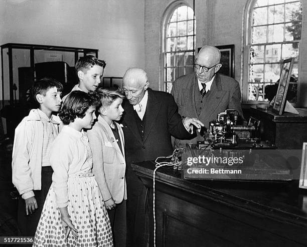 Students from West Orange Washington School watch here as Adolph Zukor, Chairman of the Board of Paramount Pictures pulls a switch to start an 1889...