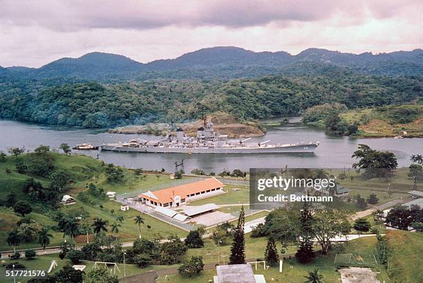 New Jersey cruises serenely through Gaillard Cut during her transit of the Panama Canal. The New Jersey is the first battleship in American history...