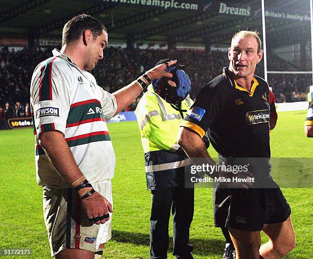 Martin Johnson of Leicester and Lawrence Dallaglio share a joke at the end of the Zurich Premiership match between London Wasps and Leicester Tigers...