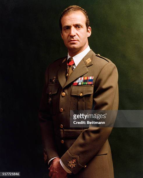 Spain's King Juan Carlos , in his uniform, ascended the throne in 1975 after the death of Francisco Franco.