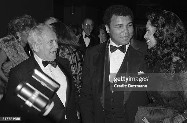 Former heavyweight champion Muhammad Ali and his wife, Veronica, chat with author Norman Mailer at a bash marking the 50th anniversary of Esquire...