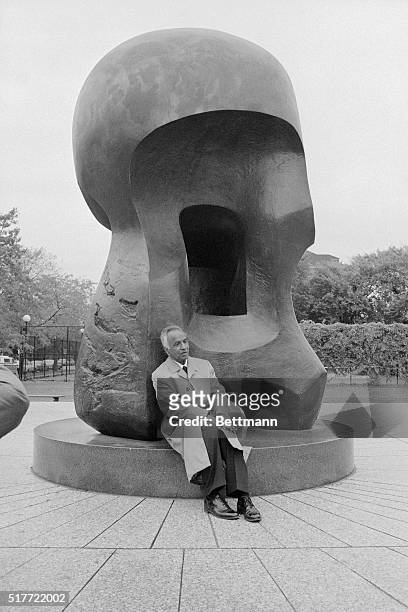 Astro-physicist Subrahmanyan Chandrasekhar of the University of Chicago pauses briefly at the base of the Henry Moore sculpture "Nuclear Energy" on...
