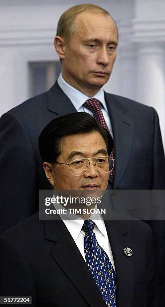 Russian President Vladimir Putin and China's President Hu Jintao listen to the Leaders Declaration at the conclusion of the APEC Meetings at the La...