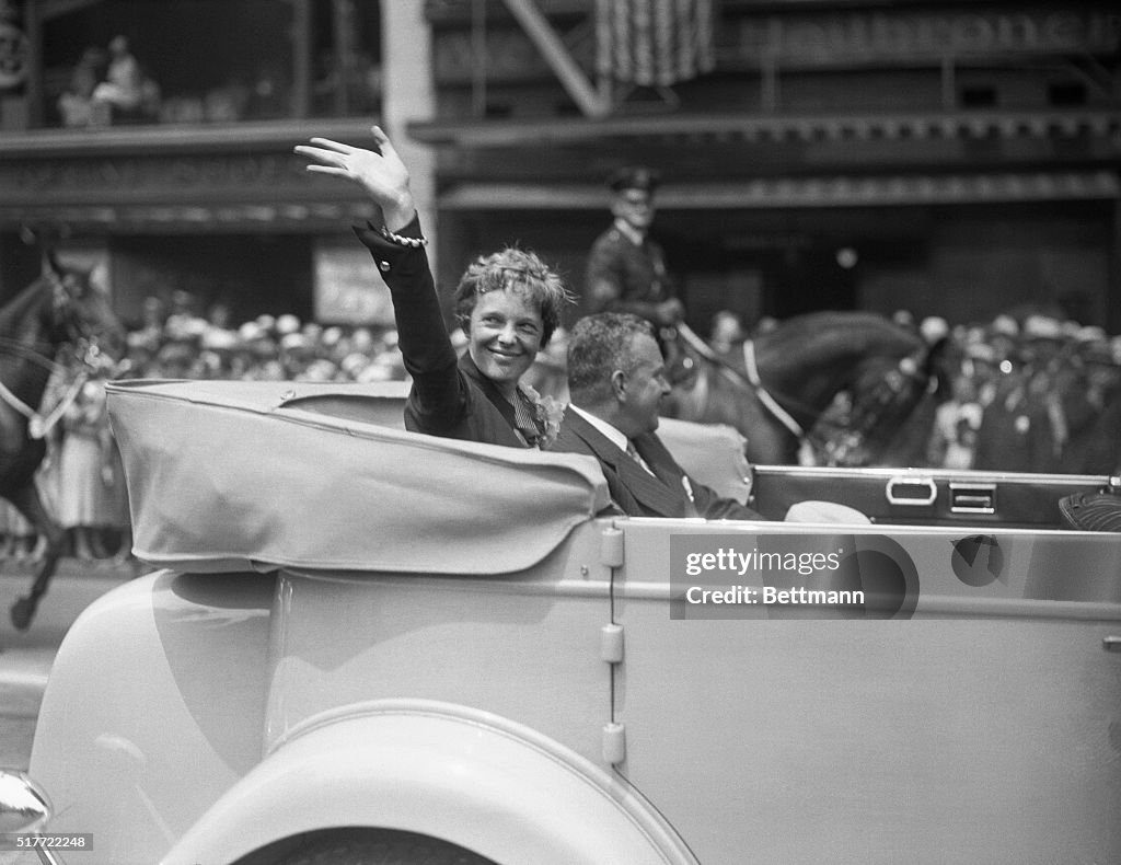Amelia Earhart Waving During Parade