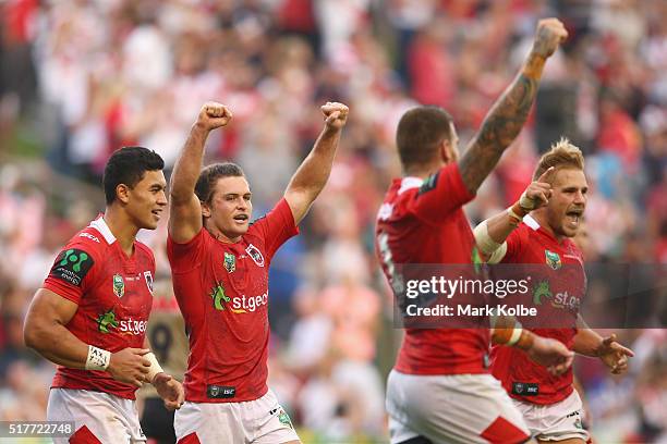 Timoteo Lafai, Mitch Rein, Josh Dugan and Jack De Belin of the Dragons celebrate victory during the round four NRL match between the St George...