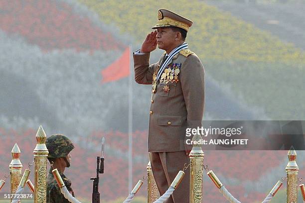 Chief Senior General Min Aung Hlaing, commander in chief of the Myanmar armed forces, salutes during a ceremony to mark the 71st Armed Forces Day in...