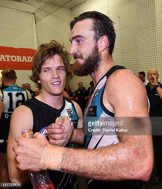 Jared Polec and Charlie Dixon of the Power celebrate after the round one AFL match between the Port Adelaide Power and the St Kilda Saints at...