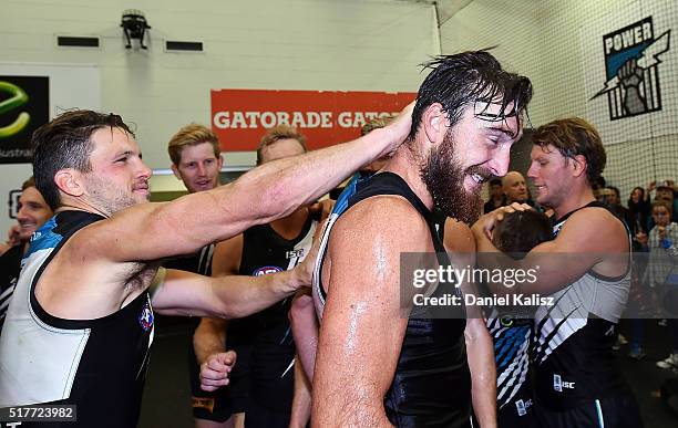 Travis Boak of the Power congratulates Charlie Dixon of the Power after the round one AFL match between the Port Adelaide Power and the St Kilda...